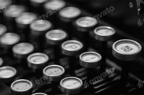 Preview: Closeup grayscale shot of typewriter keys