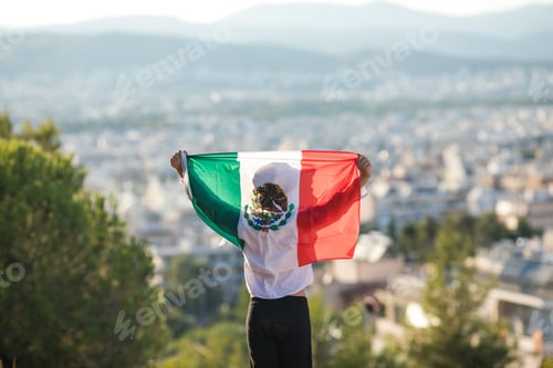 Preview: People holding flag of Mexico. "September 16. Independence Day of Mexico.