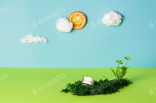 Preview: Facial cosmetic product on blue background with cotton wool clouds and orange sun