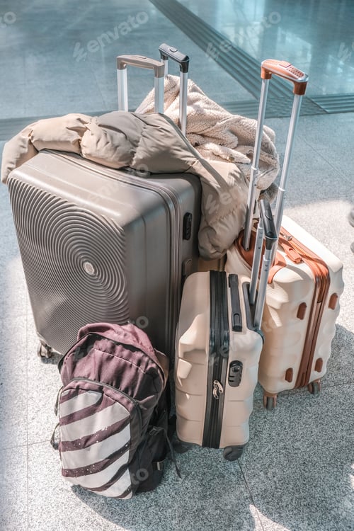 Preview: Young woman traveling solo.Traveller alone at the airport with suitcases,big luggage,travel banner