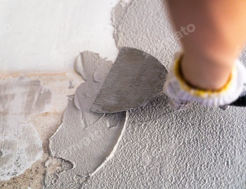 Preview: Spreading Gray Cement with Trowel Indoors