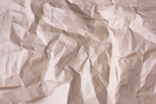 Visualização: Textura amassada de papel artesanal marrom. Fundo abstrato de papel velho reciclado.