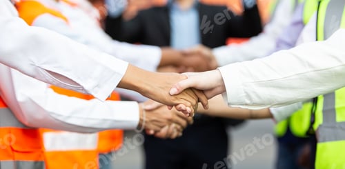 Preview: Group of successful logistic engineer worker hand shaking for business agreement