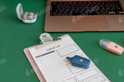 Preview: Colorful school supplies on a green background