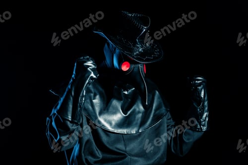 Preview: Man in plague doctor costume with crow-like mask showing yes winner gesture