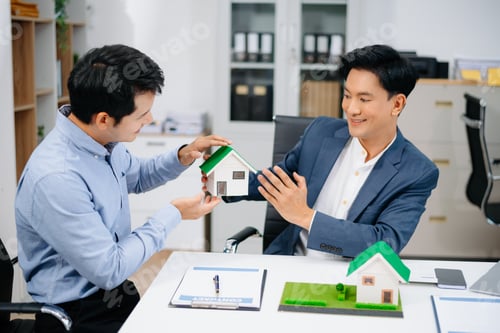 Preview: Real Estate Business Deal with Asian Salesmen and House Model