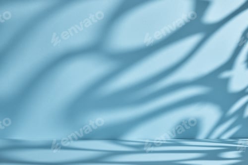 Preview: Backdrop for product presentation. Blue background with ornate shadows and light.