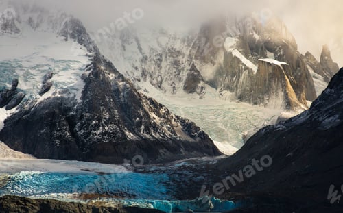 Preview: Snowy mountain formation in sunlight
