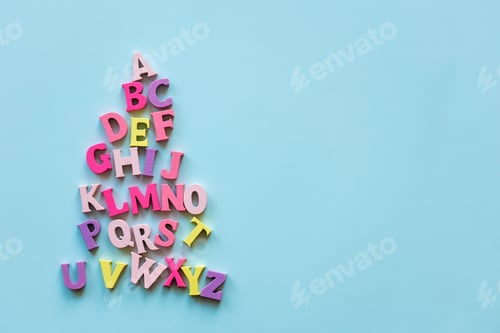 Preview: learn english language. alphabet abc letters on blue background with copy space