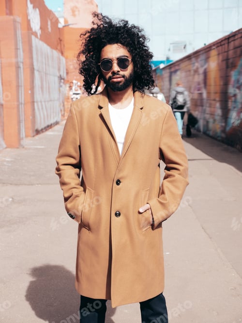 Preview: Handsome man posing outdoors