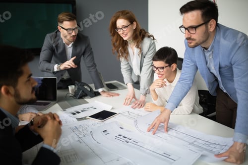 Preview: Successful business colleagues in modern conference room