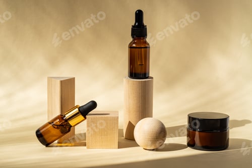 Preview: Natural essential oil or serum in brown glass bottles on a wooden podiums. Alternative medicine,