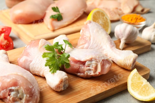 Preview: Composition with raw chicken meat on gray background, close up. Cooking chicken