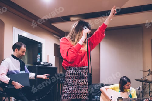 Preview: young woman singer rehearsing