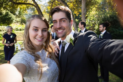 Happy couple posing in park