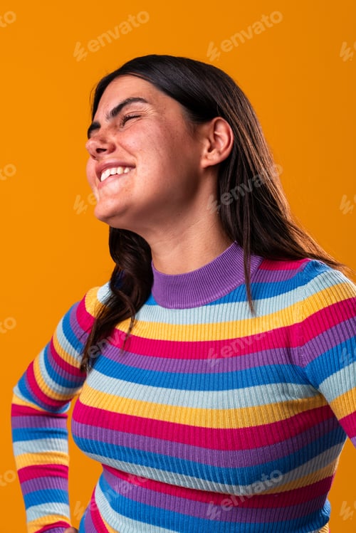 Preview: Young woman expressing joy with colorful style