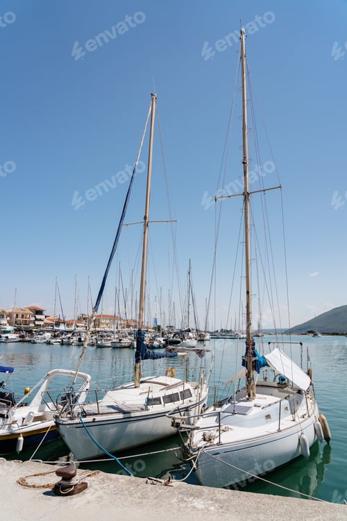 Preview: Serene Marina View with Moored Sailing Boats