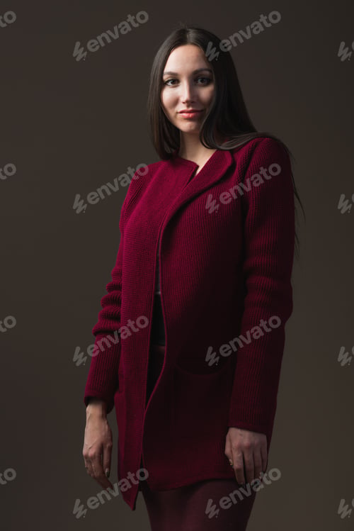 Preview: Smiling young girl model posing in stylish clothes