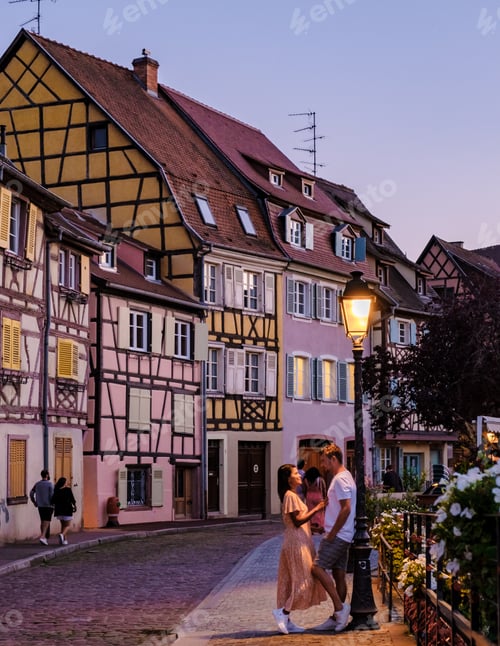 Preview: A couple of men and women at the Beautiful colorful romantic city Colmar, France, Alsace