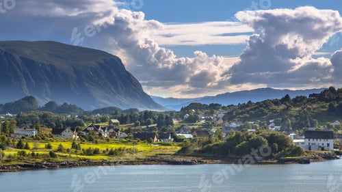 Preview: Norwegian village in fjord landscape on sunny day