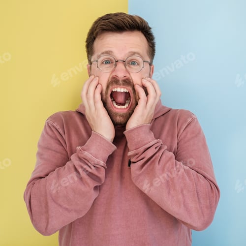 Preview: Man is stressed and screaming loudly, standing on a yellow-blue background.