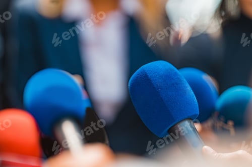 Preview: News reporters interviewing a politician.