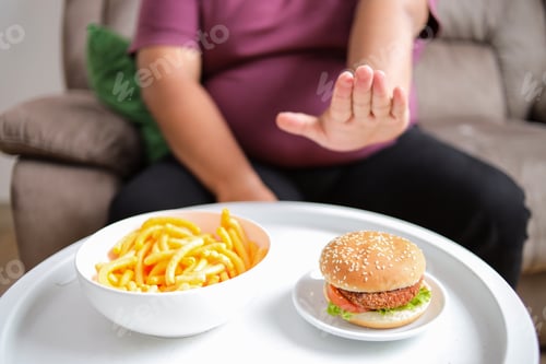 Preview: Overweight Woman Refuses Junk Food, Choosing Healthy Lifestyle for Weight Loss and Wellness