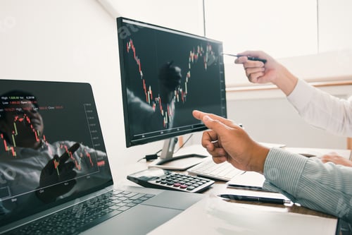 Preview: Two business stock brokers stress and looking at monitors displaying financial