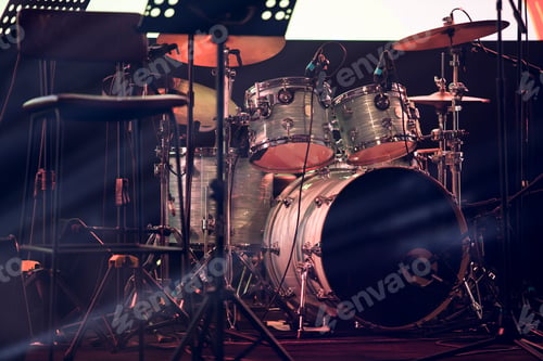 Drum Set Ready for Performance on Dark Stage