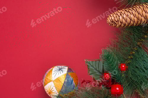 Preview: Christmas decoration and fir branches wreath with cherry and pine cone on red table
