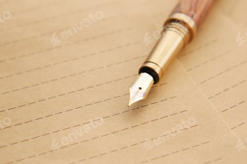 Preview: envelope , empty paper and fountain pen on table