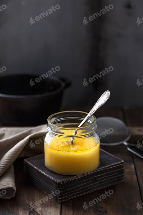 Preview: A jar of ghee or clarified butter, copy space
