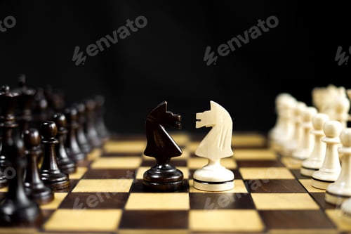 Preview: Chessboard and chess game. Competition between black and white, strategic intelligence board game.