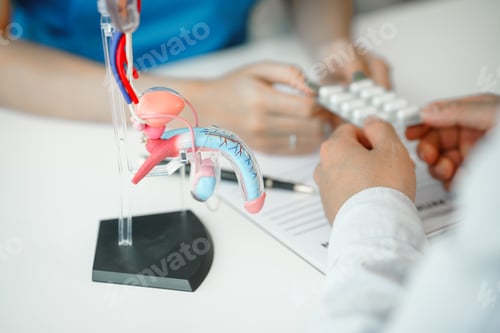 Preview: Prostate cancer, sexual dysfunction, In a clinic room, female doctor appointment at the desk