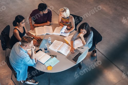 Preview: Mixed race students studying together