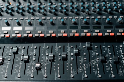Preview: A recording studio control panel mixer with an equalizer faders buttons for broadcasting of a song