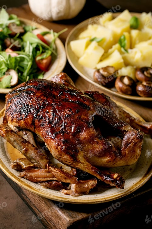 Preview: Classic dish roasted glazed duck with apples and garnish