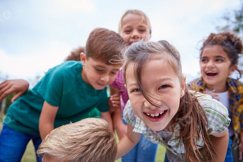 Preview: Portrait Of Children On Outdoor Activity Camping Trip Having Fun Playing Game Together