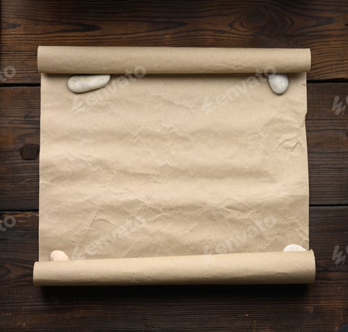 Preview: Roll of brown kraft paper on a wooden background. Place for an inscription