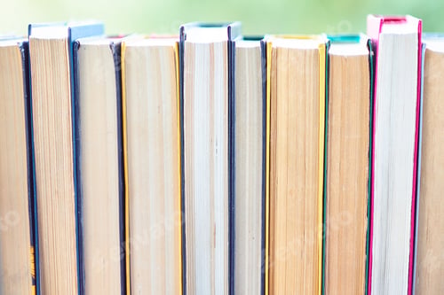 Preview: pile of old books lie on the table. home library. concept of vacation from gadgets in nature