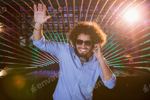 Preview: Male Dj Playing Music At The Nightclub