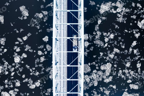 Preview: River with floe and bridge. Aerial view of winter, Poland