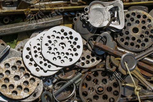 Preview: Top view of metal objects; old keys, tools, meat grinder plates. Old soviet handful equipments