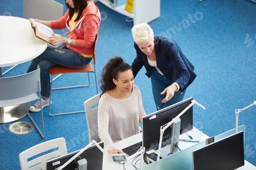 Preview: University students working in library