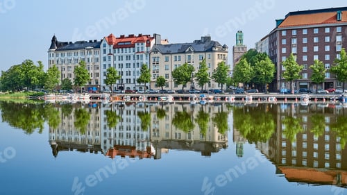 Preview: A perfect reflection of the City on a summer morning.