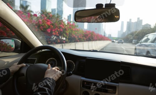 Preview: People driving car on city road