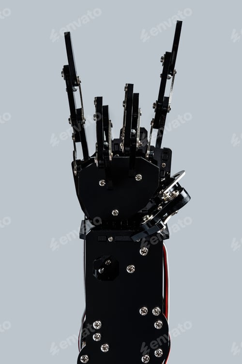 Preview: Real robotic hand makes the sign of the horns against grey background