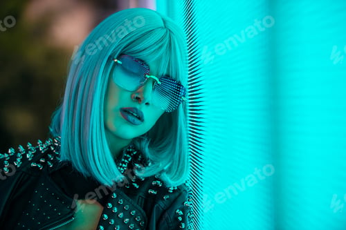 Preview: Beautiful woman illuminated by led lights