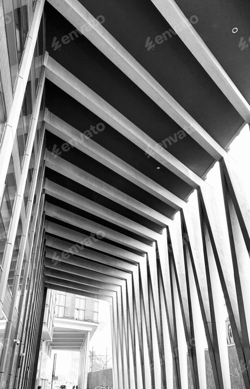 Preview: Grayscale shot of a building with abstract geometric concrete architecture in Amsterdam