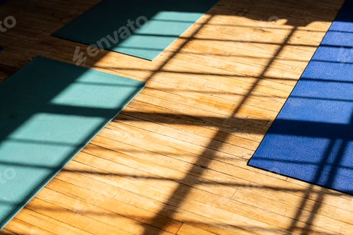 Preview: Yoga Mats on Hardwood Floor in Sunlight
